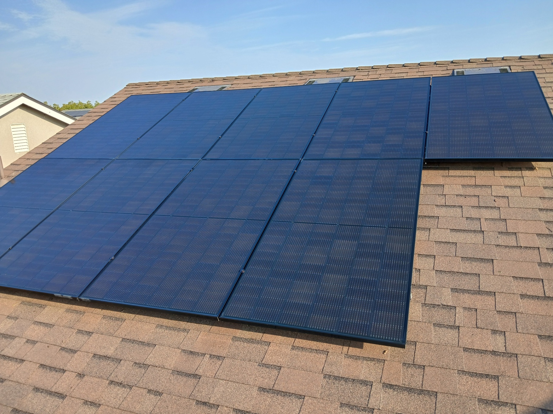 Clean solar panels on residential roof
